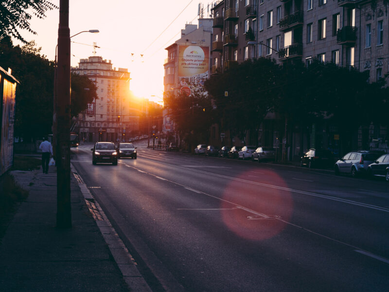 City street with cars in evening light